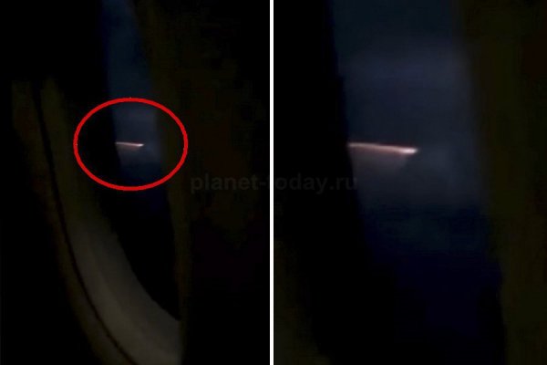Пассажир самолета сфотографировал во время грозы НЛО